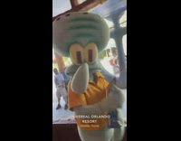 Squidward costume person at Universal Orlando Resort with Gone Jellyfishing sign 