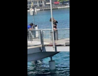 Woman sexy dance video shoot at dock