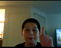 Boy makes funny jokes and plays harmonica