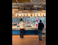 Cut out of Jalen Brunson on seafood section of supermarket