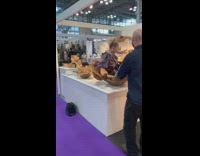 Girl gets stuck wood shell for photo