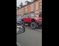 Collab Clips MPUGC - Lifted red mini cooper parked