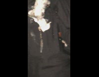 Guy asleep with melted ice cream in wrapper on top of the blanket 
