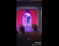 standup comedy stage weed black shirt guy
