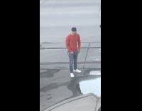 Guy red shirt water puddle soft box 