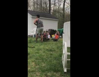 Little boy screams Whats wrong with you after guy pulls and tips over wagon on the grass