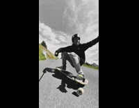 Guy rides longboard down asphalt hill snow 