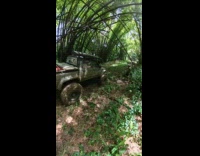 Collab SendItOfficiall - Hilux powering through muddy road 