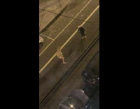 Guy hat underwear sing loudly street night