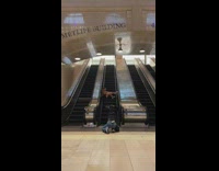 Woman silver high heels sit broken escalator part 2