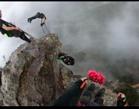POV of 3 guys parachuting in the air 