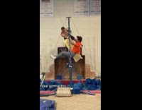 Man swings and fell on metal pole