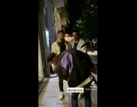 Guy walks by two guys gets slapped 