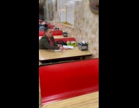 Collab WINY - Woman with covid swab test in pizza store