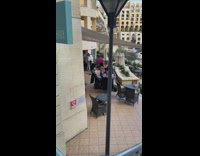 Guy has photoshoot at busy restaurant 