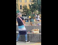 Woman photograph hairy dog with sunglasses fountain