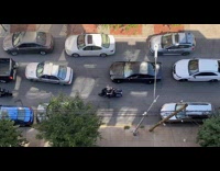 Collab WINY - Motorcycle riders group passing through street traffic 