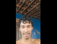 Shirtless guy show his bent thumb fingers