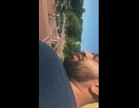 Guy models for photo at park