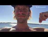 VFX guy on beach moves sail boat 