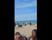 Collab IITW - Man with Driftwood Poses at Beach for Pictures