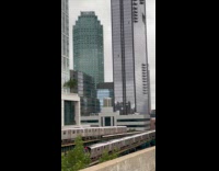 Collab WINY - Woman sings while two trains pass by