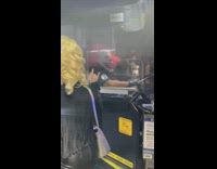 NYC bus driver has red clown mask on
