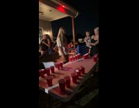 Toddler able to shoot ball in beer pong