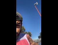 Man shows a fly on his fingertip