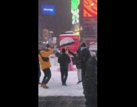 Girl wearing pink dress and crown snow