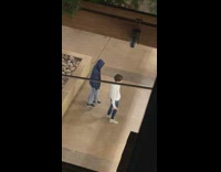 Two girls practice dance tiktok outside night