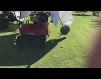 Golf cart crashes through canopy tent