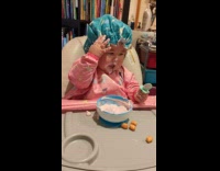 Baby always touches hair with its messy hands