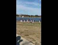 Group women same dance black jacket lake