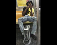 man shaves using iphone camera