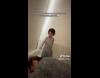 Jealous toddler pulls moms hair away from dad 