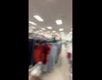 Man pranking strangers with spider on hair 