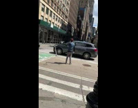 Guy swings tennis racquet