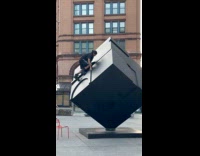 Collab WINY - Guy climbs top of Astor Place Cube