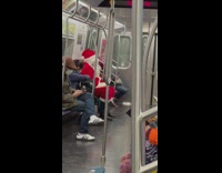 Person in Santa Claus Costume Sits Still