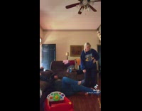 Brunette woman falls while doing Tik Tok dance 