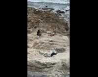 Woman white bikini cobra stretch pose beach