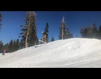 grey jacket man skiing lost control falls