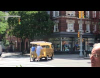 Collab WINY - Men help push truck to side of street
