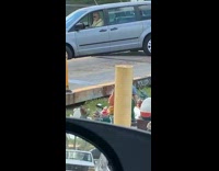 Man on the elevated road drives down to change lane