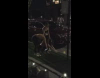 3 ladies stand on sidewalk waiting to film video 