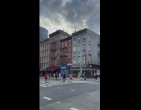 Guy plays guitar on rooftop 