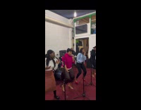 African performers sing and dance 