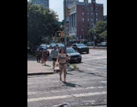 Woman swimsuit cross street goldfish in wine glass
