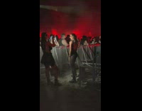 Lady in See-Through Clothes Dances Along to Music